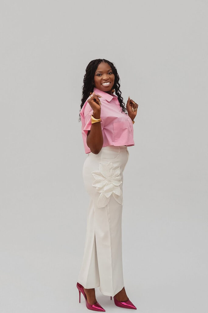 past calista on a white studio background smiling at the camera2